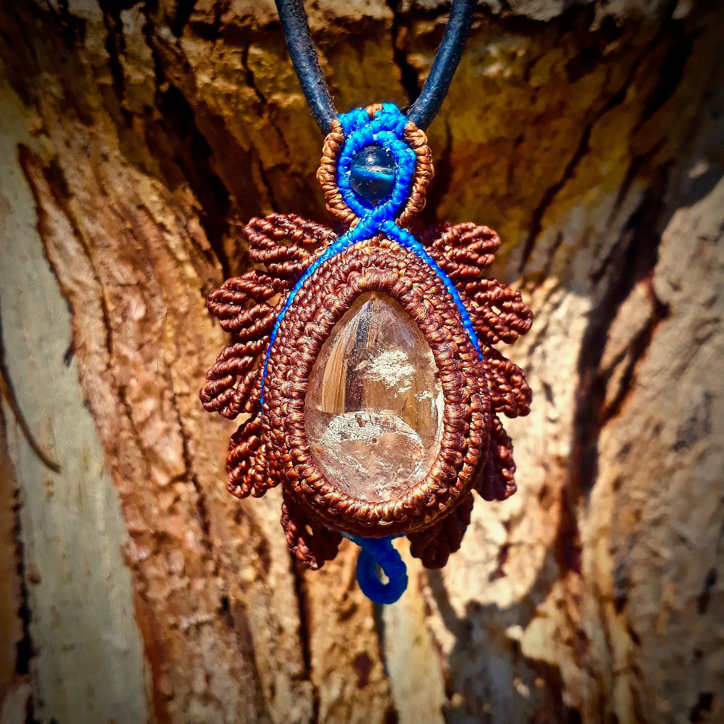 Smoky quartz (with another quartz and mud inclusions) pendant